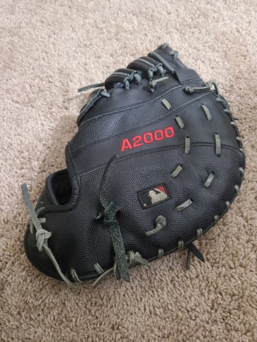 Black Used Adult Wilson Left Hand Throw First Base A2000 Baseball Glove 12.25"