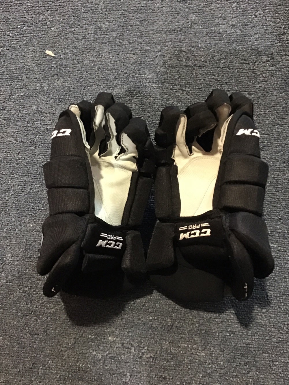 Nathan MacKinnon Colorado Avalanche Black CCM Game Worn Gloves