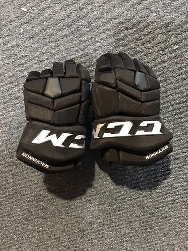 Colorado Avalanche New Black Pro Stock CCM HGTK Gloves 14”  Nathan MacKinnon