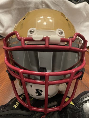 Used Large Schutt Vengeance VTD II Helmet with face mask, chin strap, and visor