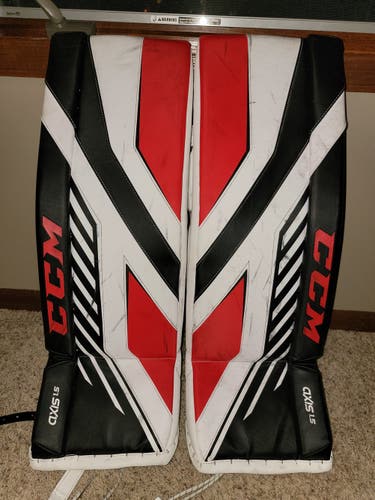 White Used Junior 30 +1" CCM Goalie Leg Pads