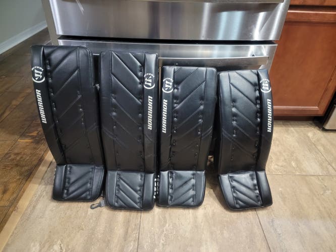 Black Used Junior 26" Warrior Ritual G4 Goalie Leg Pads