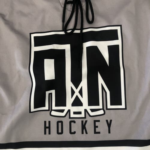 At The Net youth large hockey jersey