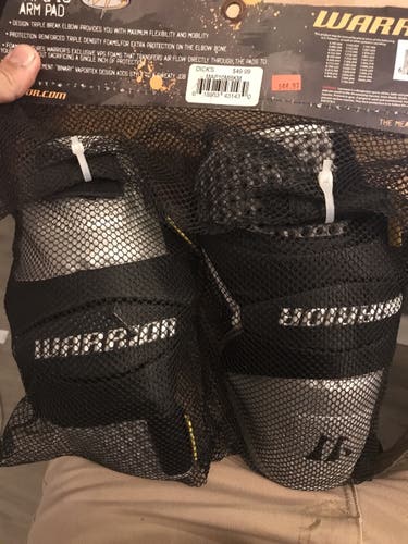 Brand new never opened warrior arm pads