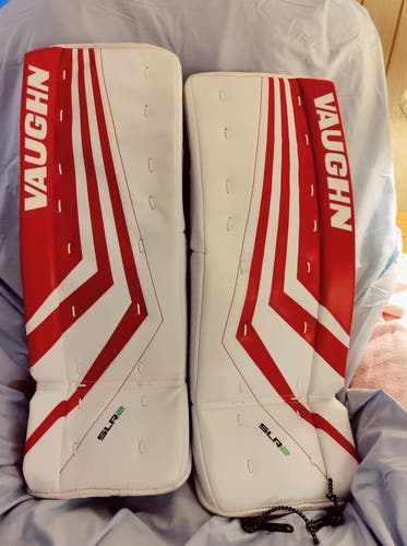 White Used Junior 26" Vaughn Ventus SLR2 Goalie Leg Pads