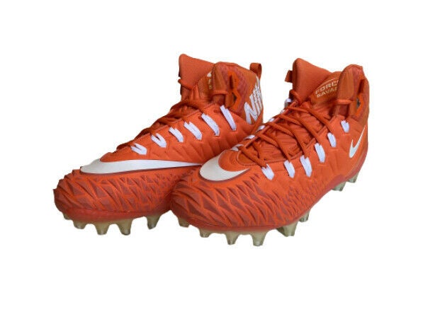 orange and white nike cleats