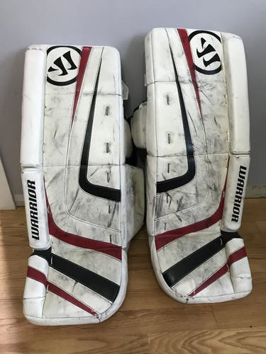 White Used Junior 26"+1 Warrior Goalie Leg Pads