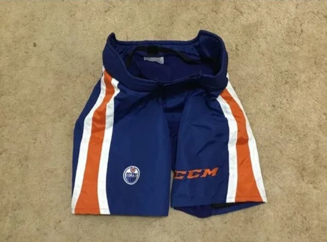 @Lv08Am12 Bundle: CCM PP90 Pro Stock Oilers Shell & CCM HGQLXP 14" RNH Gloves