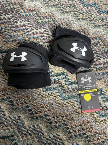 UA revenant elbow cap , black size medium