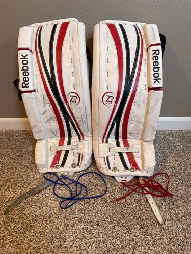 White Junior 24" Reebok  Premier 4 14K Goalie Leg Pads
