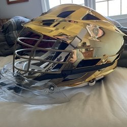 Notre Dame team issued Gold Helmet