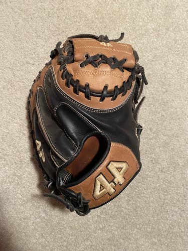 Used 44 Pro Signature series 34' catchers mitt