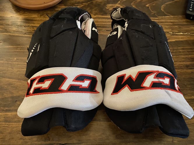 NCAA UNO #27 Matt Miller Mavericks CCM Game Worn gloves 14” Sioux City Musketeers