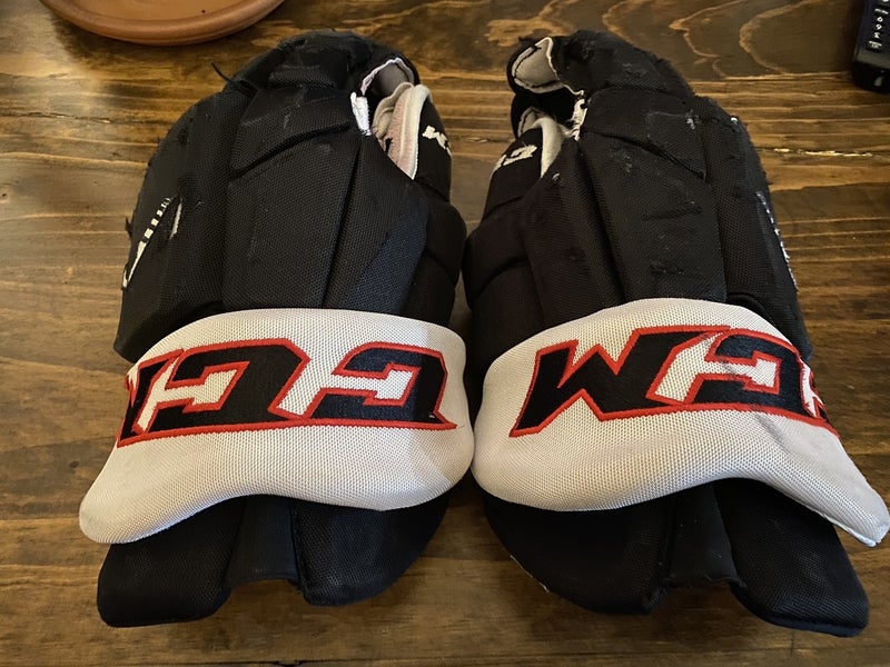 NCAA UNO #27 Matt Miller Mavericks CCM Game Worn gloves 14” Sioux City Musketeers