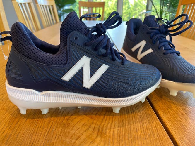 Brand new.  New Balance Men's COMPTN2 Cleats