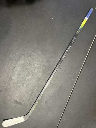 Warrior Alpha DX Pro Stock Stick RH 95 flex