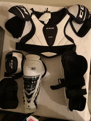 Youth 8” Hockey shin guards, shoulder pads, elbow pads