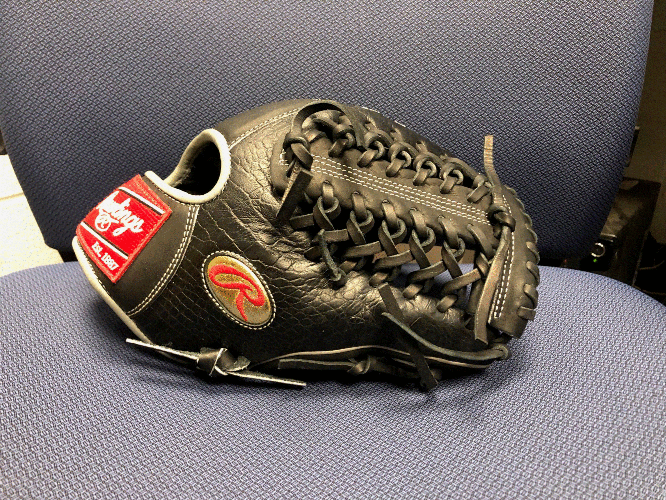 Black - New Adult Rawlings Right Hand Throw Infield Heart of the Hide Baseball 12"