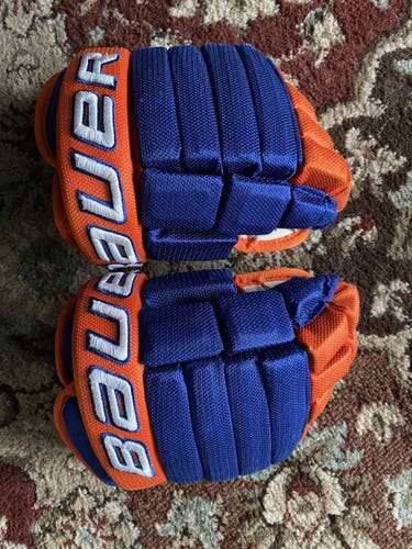 Islanders Blue and Orange Gloves Used Youth Bauer size 10"