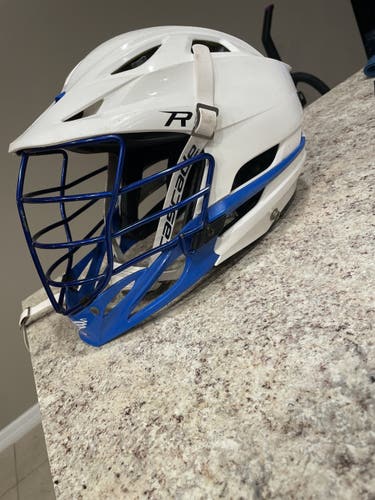 White / blue cascade mens lacrosse R helmet