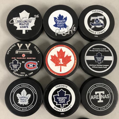 Toronto Maple Leaf hockey pucks from $5 each