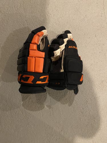 Black Used CCM 15" Tacks 4 Roll Gloves