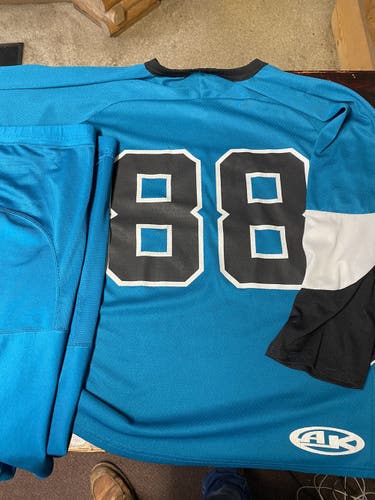 Teal Sharks Color #88  Used Large   Jersey And Socks