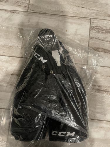 Black Junior Medium CCM HPLTP Hockey Pants