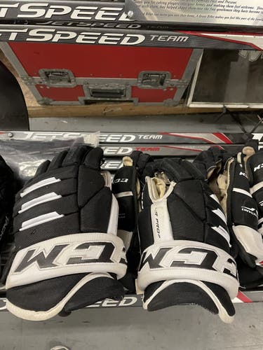 Black Used CCM 13’ Pro Stock Tacks 4 Roll Pro Gloves