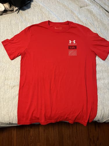 Red Under Armour Shirt And Nike Pants