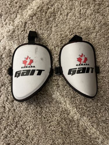 Gait box lacrosse bicep pads.