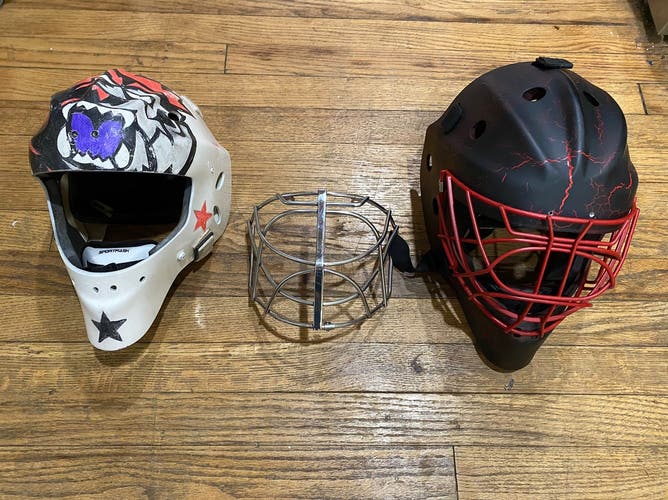 Two Used Goalie helmets