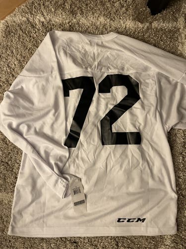 CCM white practice hockey jersey