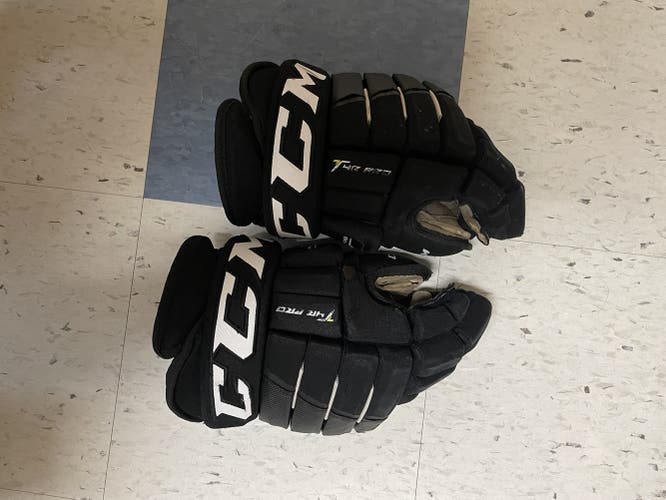 Used CCM 14" Tacks 4 Roll Pro Gloves