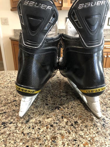 Senior Bauer Regular Width  Size 9.5 Supreme Total One Hockey Skates