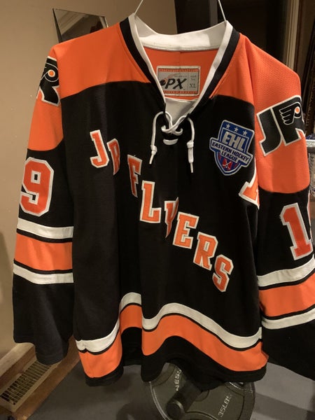 Orange /white pair of Junior Flyers Jersey Adult Unisex Used XL