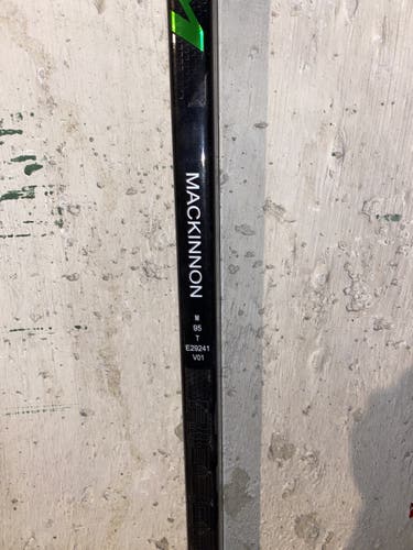 Nathan Mackinnon RibCor 40K Dressed As Trigger 5 Prostock Hockey Stick