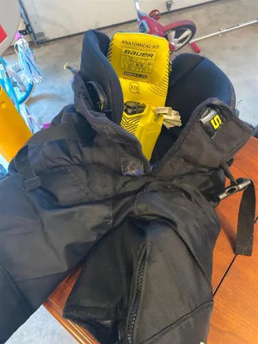 Black Junior Medium Bauer Supreme 1S Hockey Pants