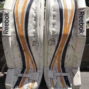 White/Yellow Used Intermediate 29+1" Reebok 18K Goalie Leg Pads
