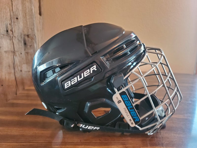 Used 4 times Medium Bauer IMS 5.0 Helmet