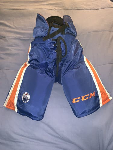 CCM Edmonton Oilers NHL Pro HP45 Hockey Pants Large - NEW Navy/orange/white