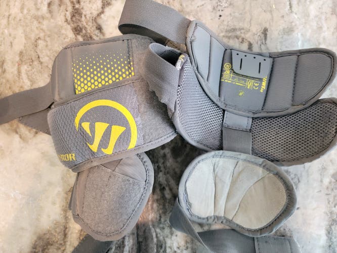 Used Warrior Ritual Jr Goalie Knee Pads