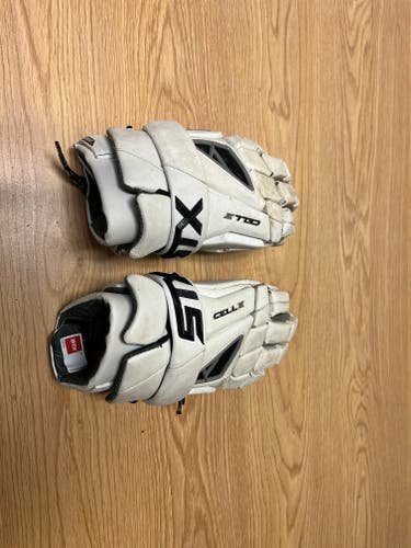 White Player's STX Cell IV Lacrosse Gloves