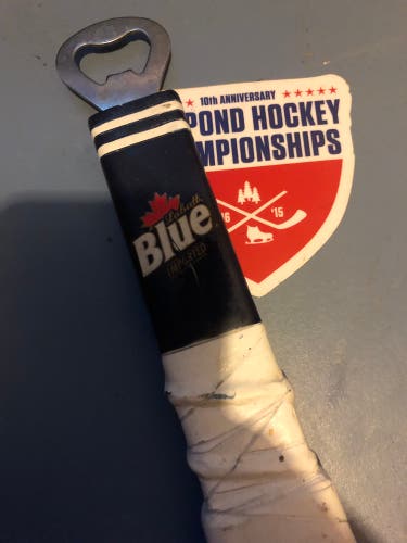 Labatt Blue hockey stick bottle opener from 10th anniversary US Pond Hockey Championships