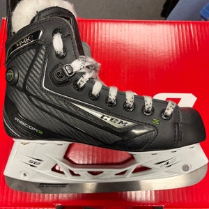 Junior CCM Regular Width  Size 4.5 RibCor 44K pump Hockey Skates
