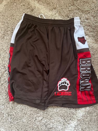 Used pair of brown lacrosse shorts