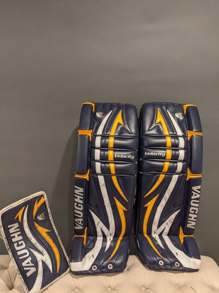 Used 35" Vaughn Velocity V4 Goalie Leg Pads and blocker
