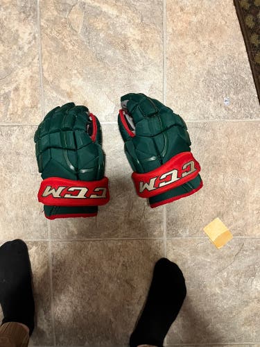 IOWA WILD used gloves. CCM 14" Pro Stock HG12 Gloves