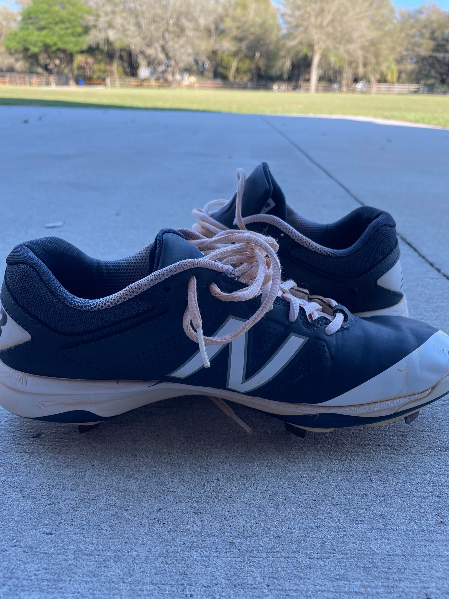 white new balance cleats