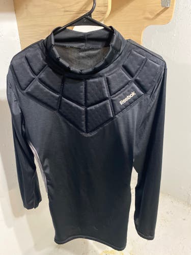 Used Reebok Goalie padded shirt senior large